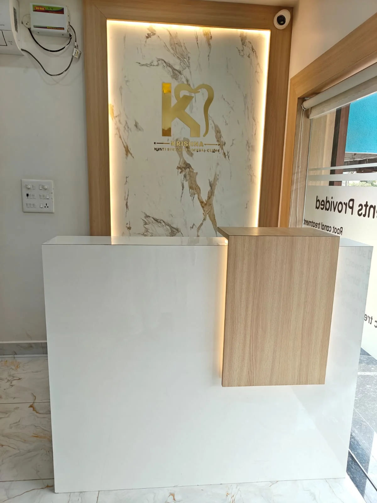 Modern welcoming reception counter at Krishna Dental Clinic Gudivada